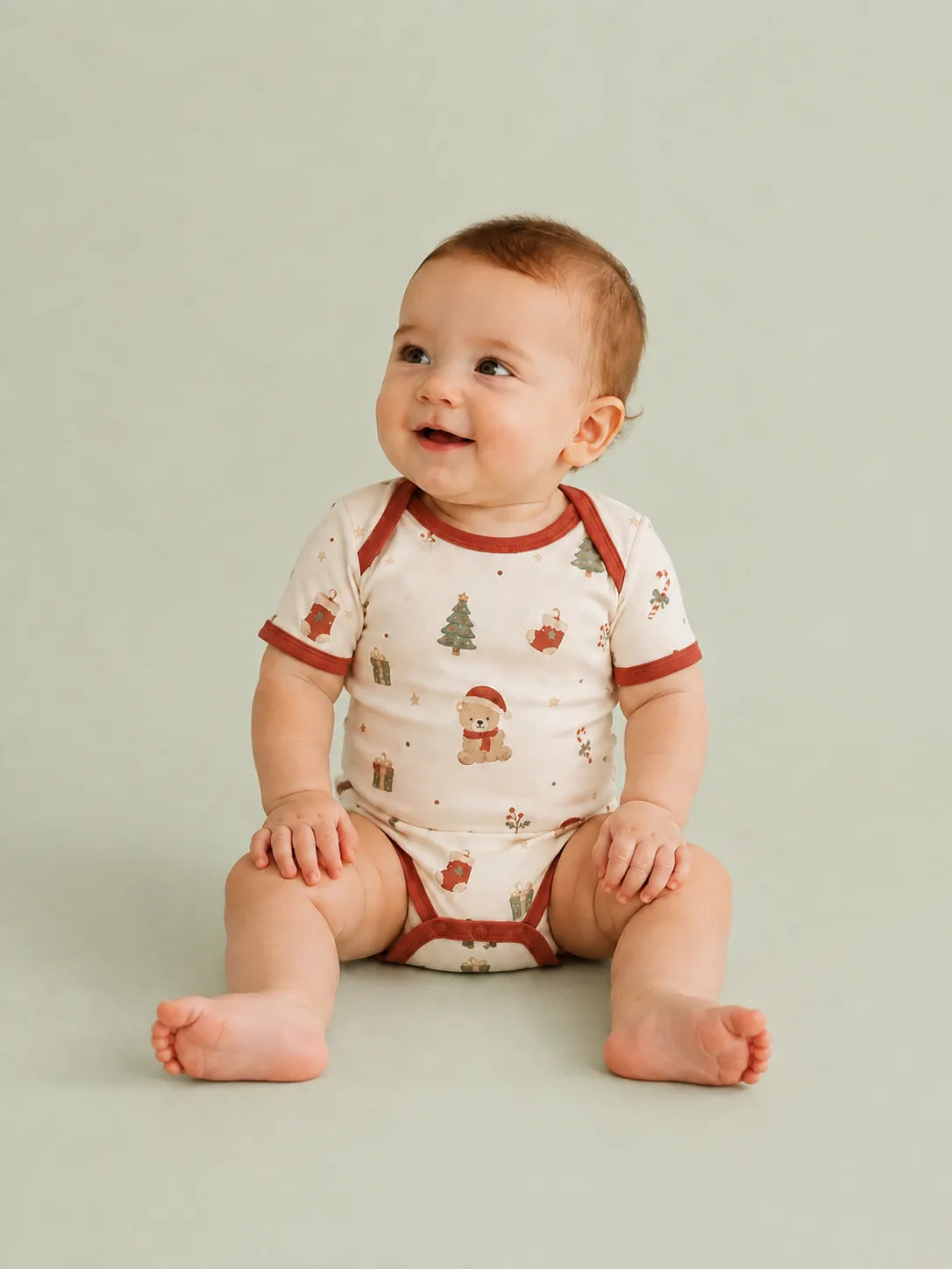 Baby wearing the Christmas Teddy short sleeve bodysuit