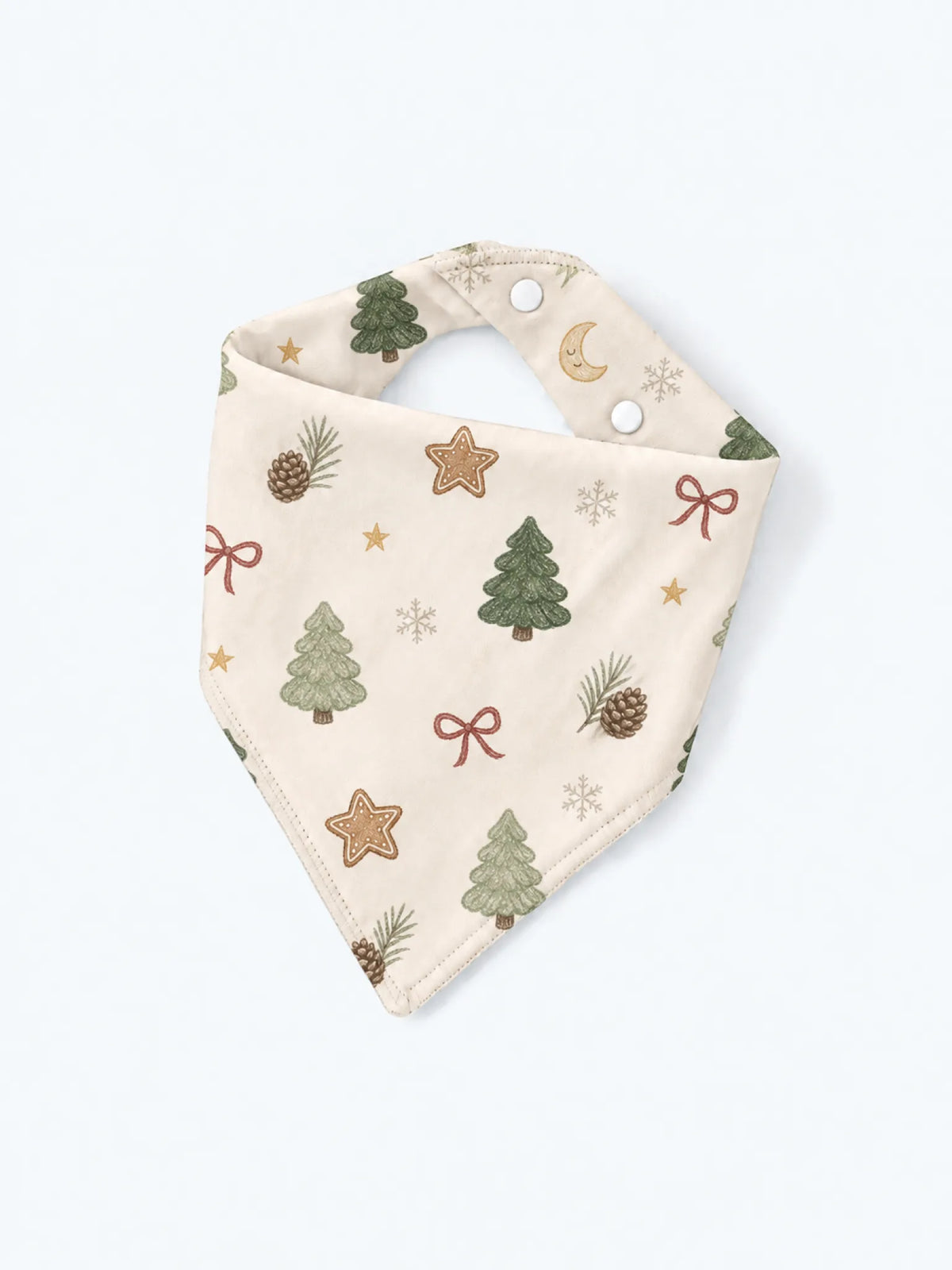 MossiBaby Christmas Forest baby bandana bib product view featuring evergreen trees, bows, stars, pinecones and winter details