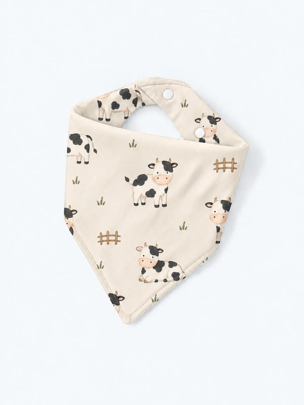 MossiBaby Little Moo baby bandana bib product view featuring playful little cows in a friendly farm-inspired print
