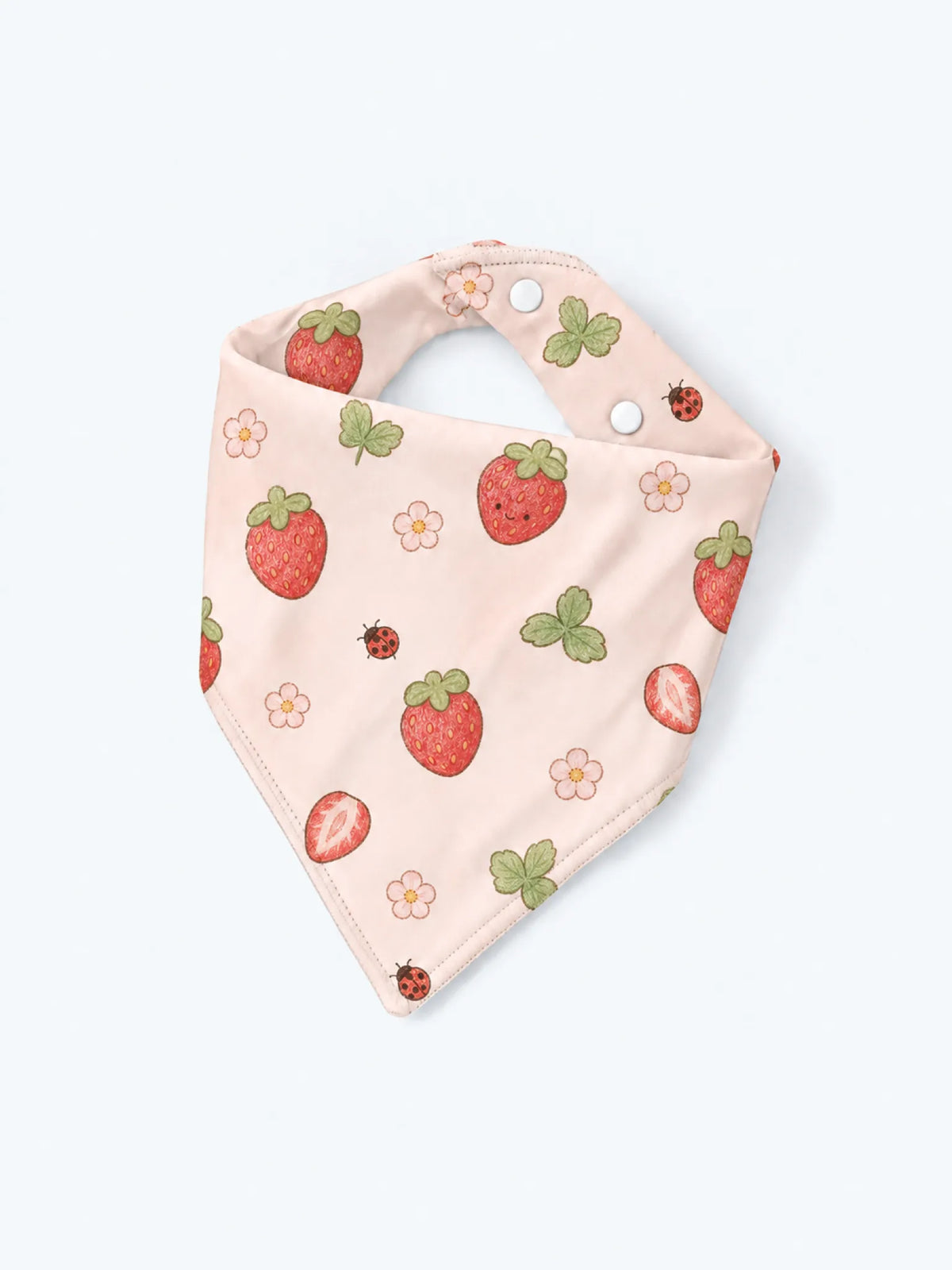 MossiBaby Strawberry Fields baby bandana bib product view featuring ripe strawberries, tiny flowers, leaves and ladybugs on a blush ground