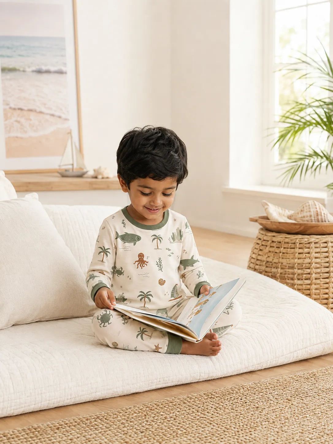 Child playing at home in Coastal Friends bamboo pajamas