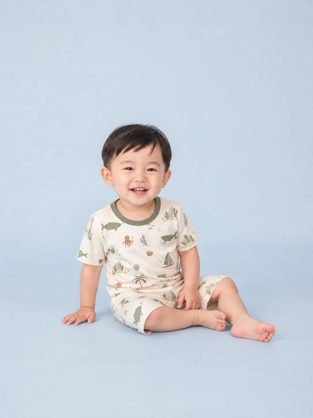 Child wearing the Coastal Friends short sleeve pajama set