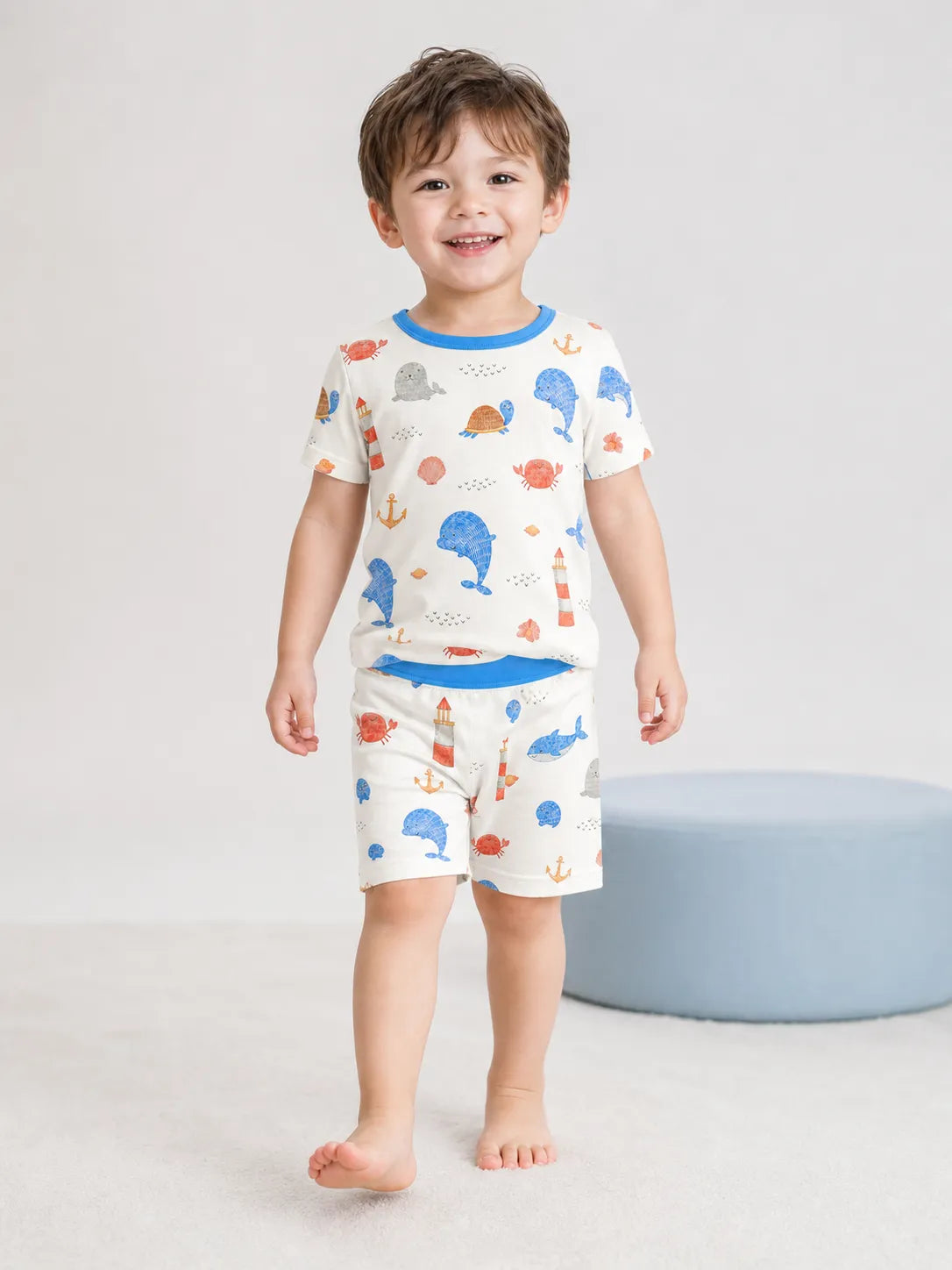 Child wearing the Whale Harbor short sleeve pajama set
