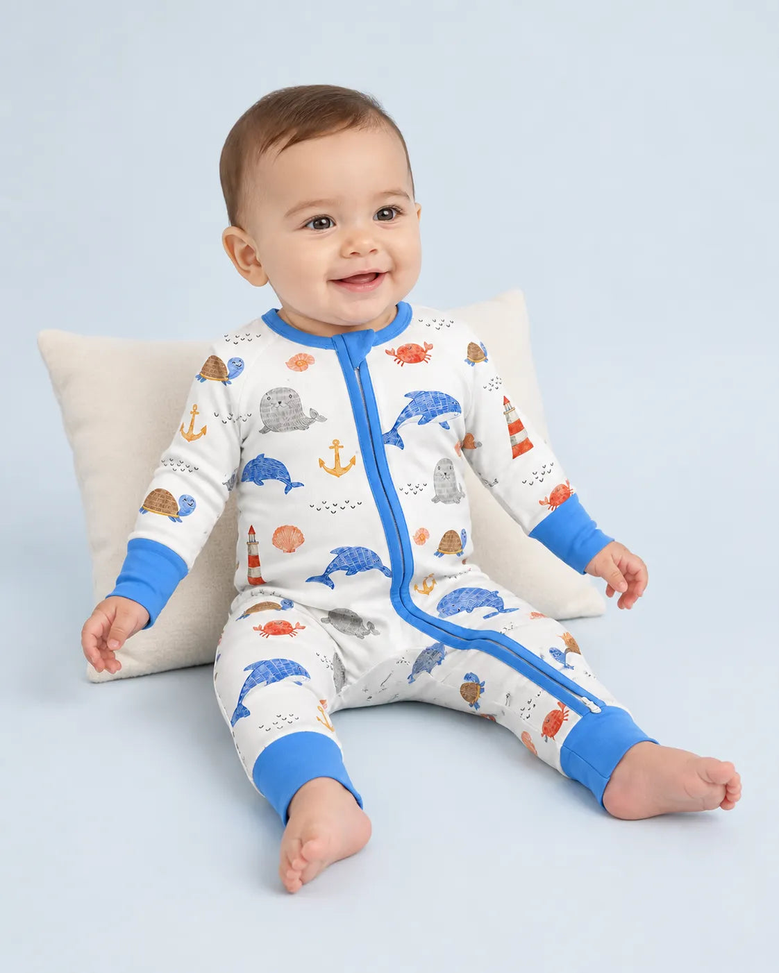 Baby playing at home in the Whale Harbor zipper romper