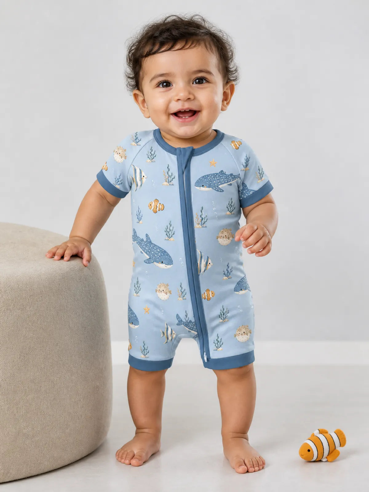 Baby wearing the Shark Cove bamboo shorty romper