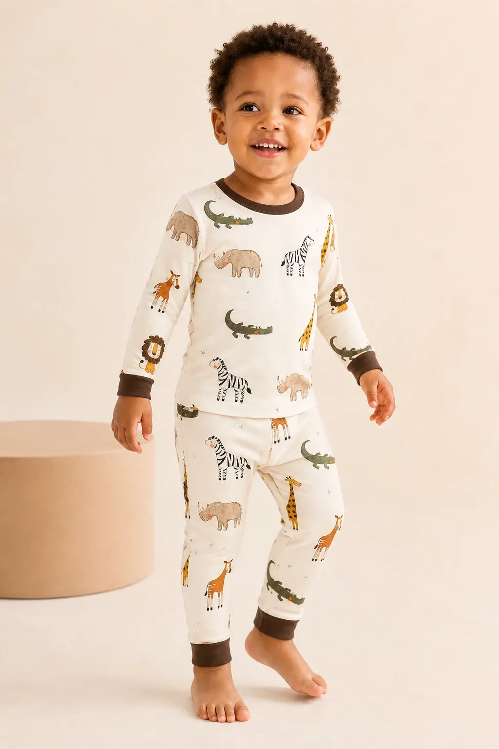 Child wearing the Safari Friends long sleeve pajama set