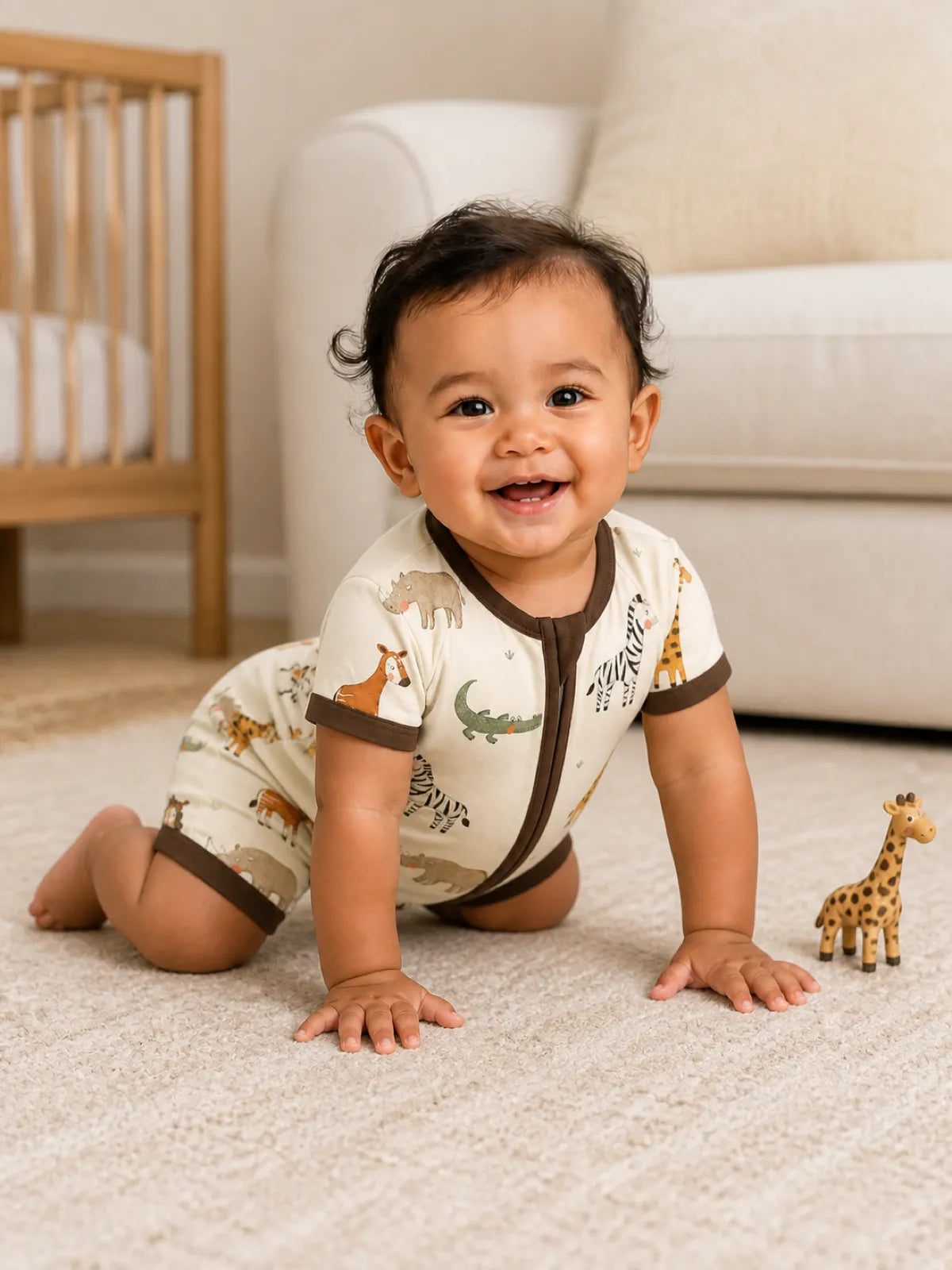 Baby playing at home in the Fox Meadow shorty romper