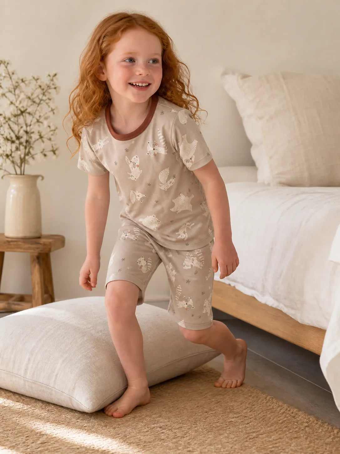 Child playing at home in Fox Meadow bamboo pajamas