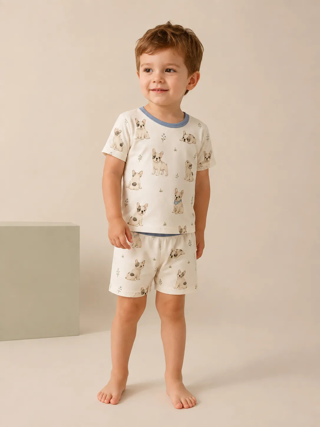 Child wearing the Frenchie Friends short sleeve pajama set
