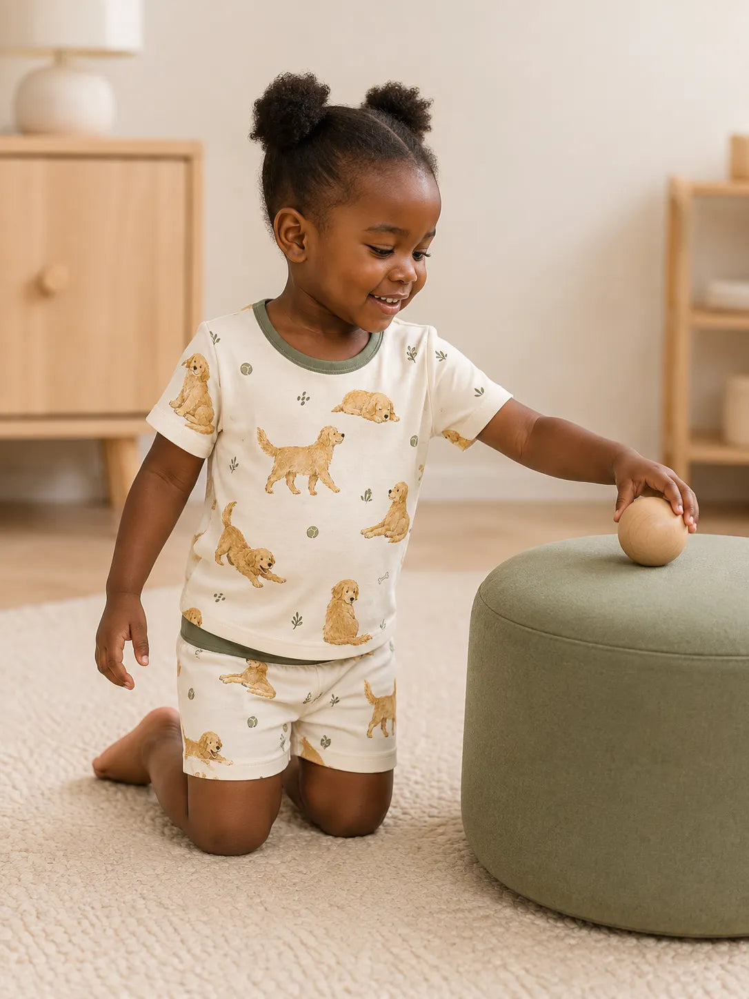 Child playing at home in Golden Days bamboo pajamas