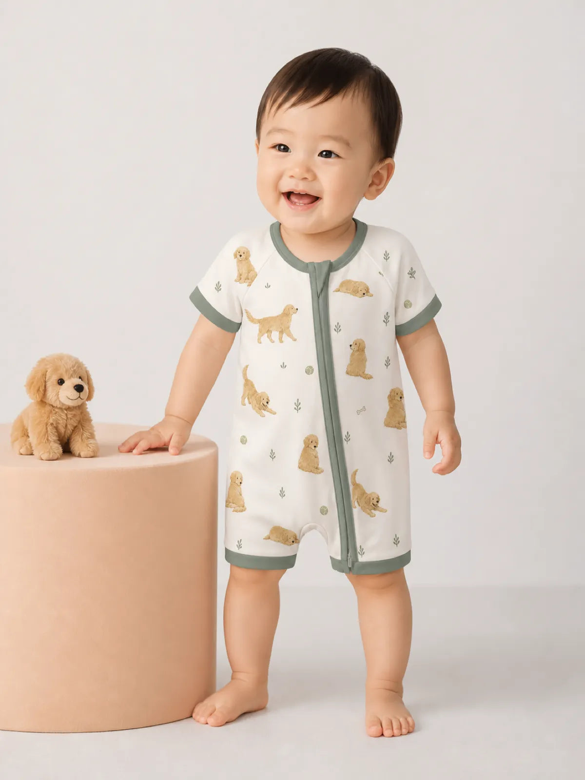 Baby wearing the Golden Days bamboo shorty romper