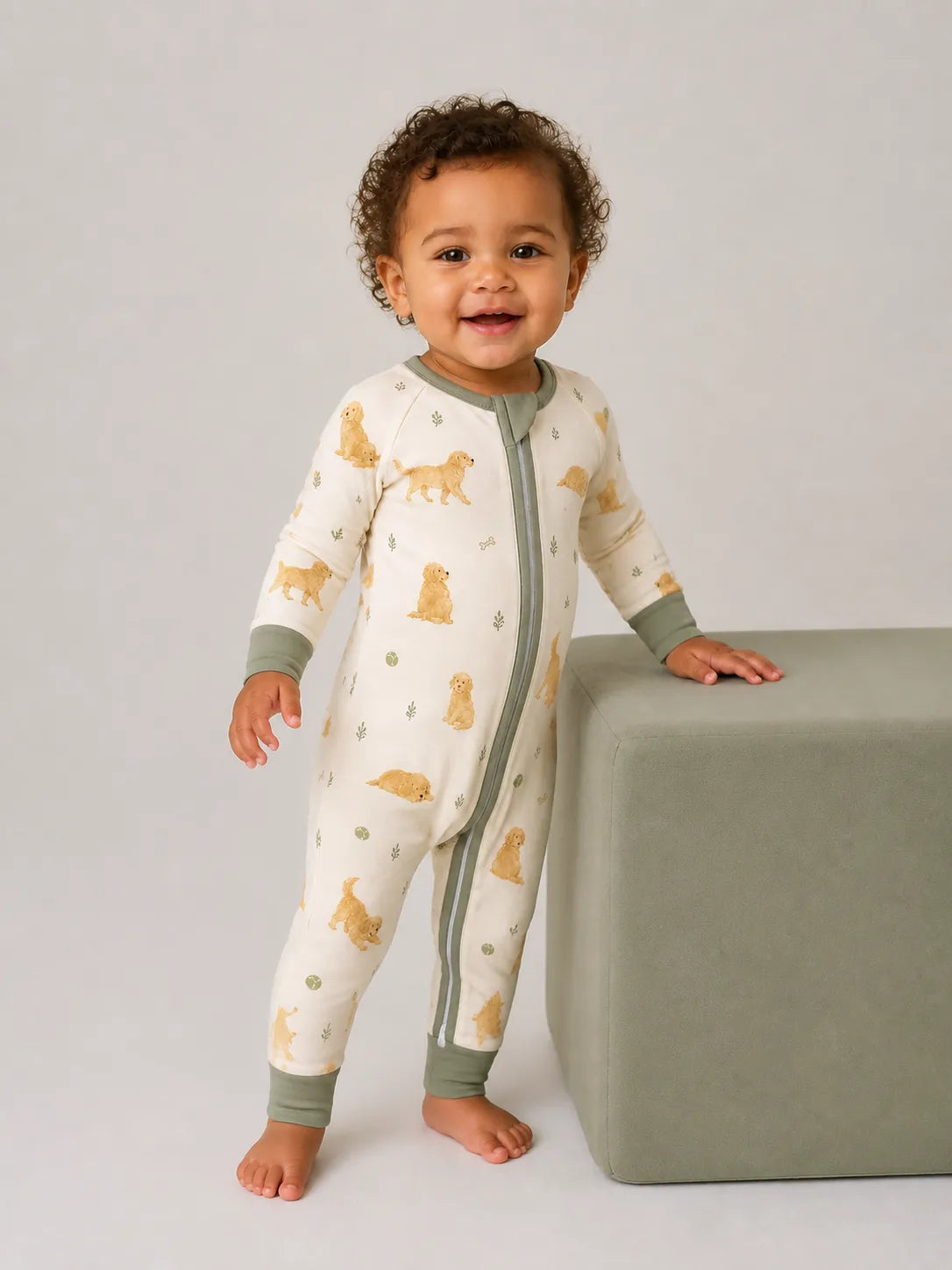 Baby wearing the Golden Days bamboo zipper romper