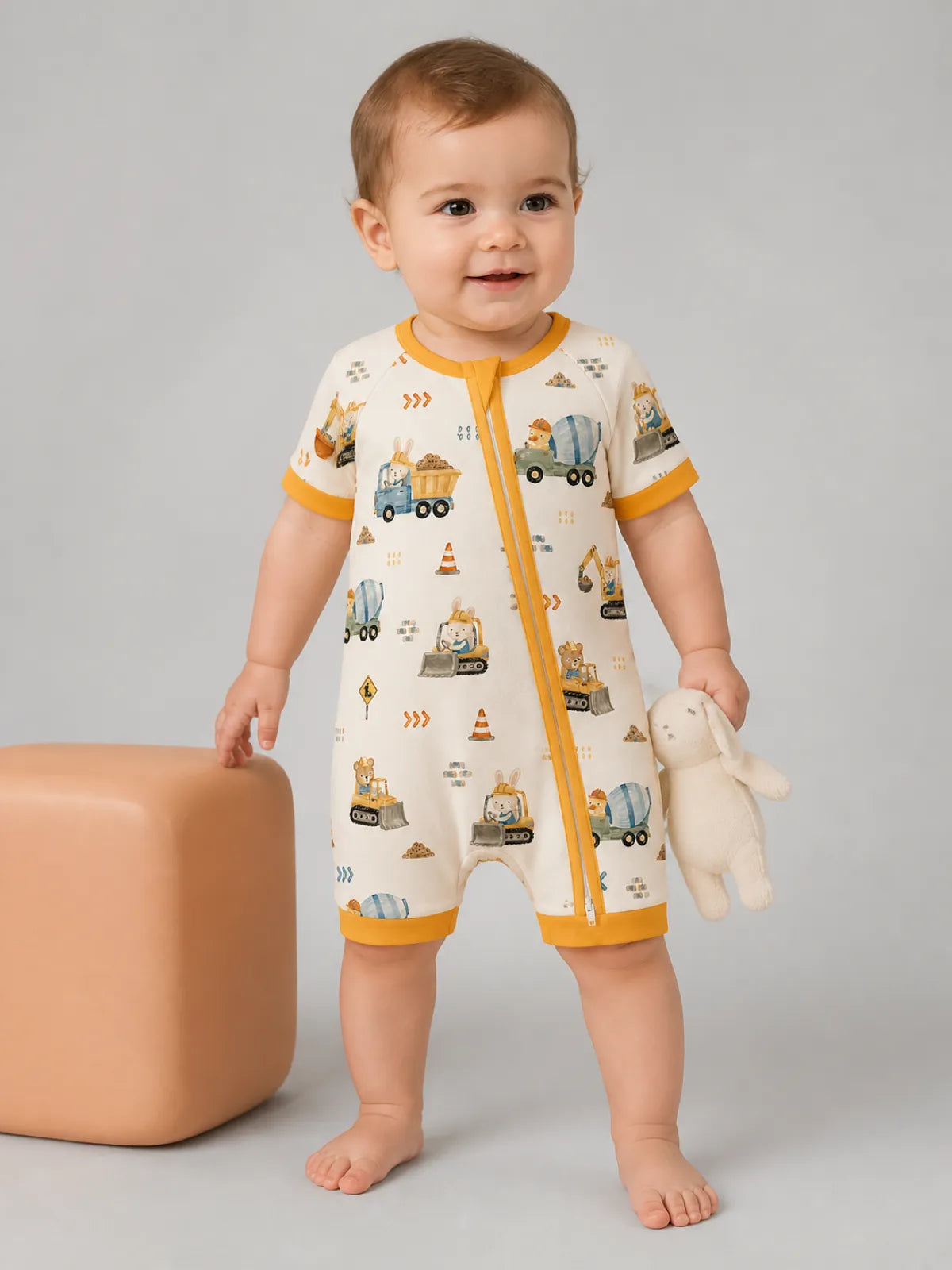 Baby wearing the Construction Crew bamboo shorty romper