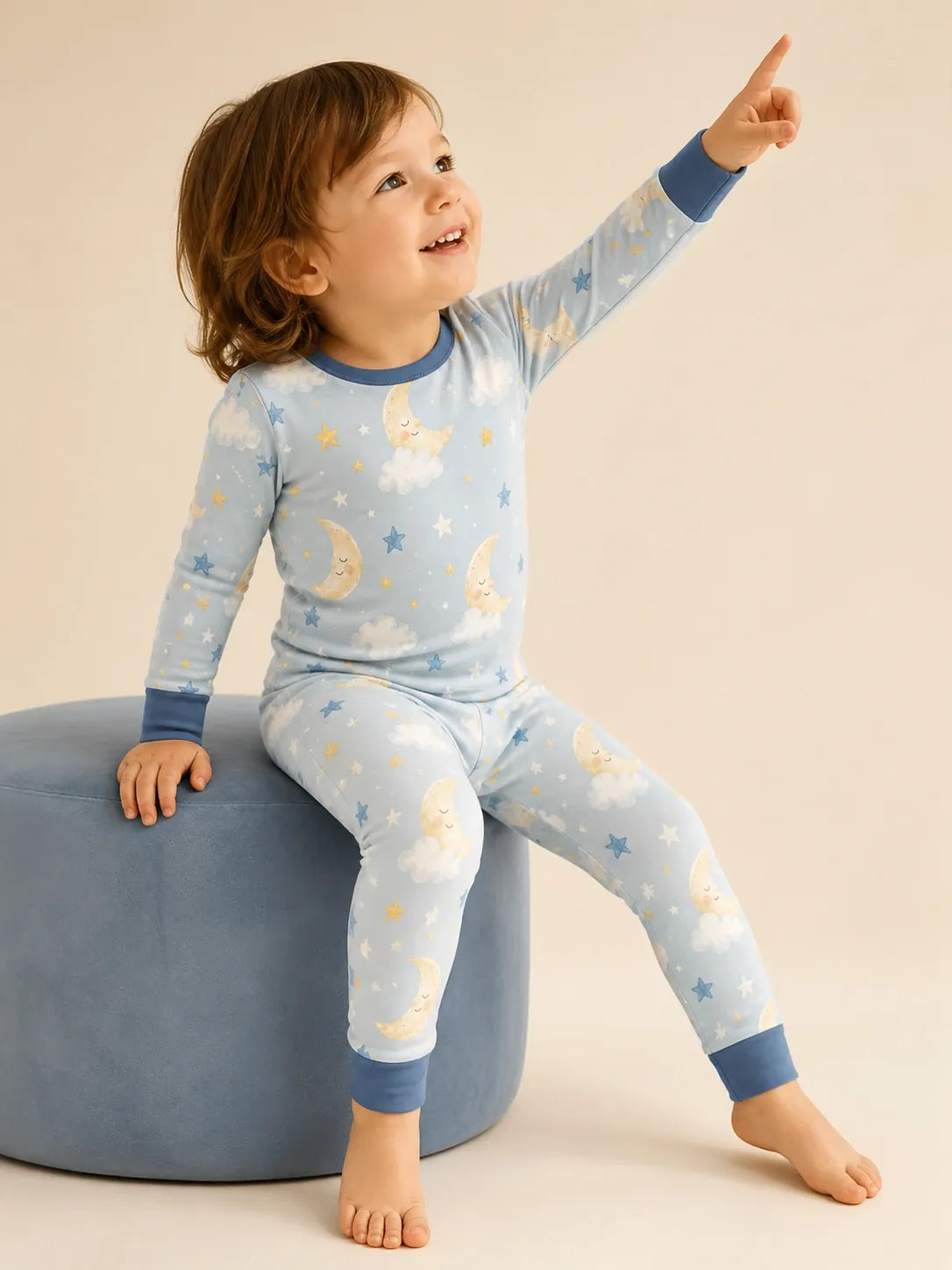 Child wearing the Moonlit Dreams long sleeve pajama set