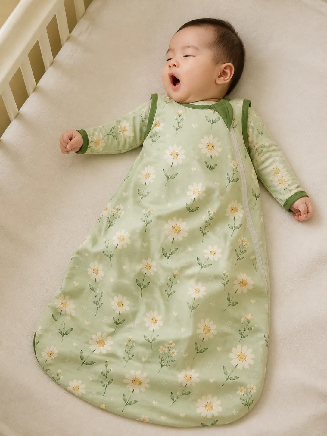 Baby resting comfortably in the Daisy Meadow bamboo sleep bag