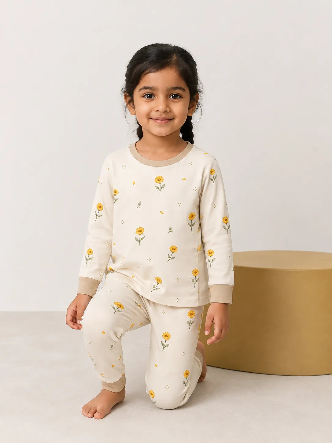 Child wearing the Golden Bloom long sleeve pajama set