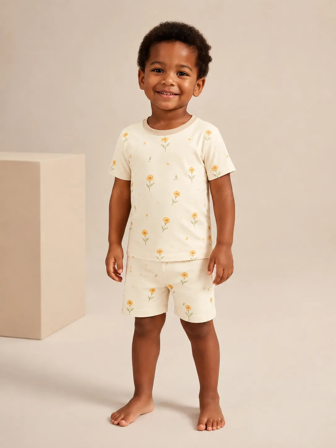 Child wearing the Golden Bloom short sleeve pajama set