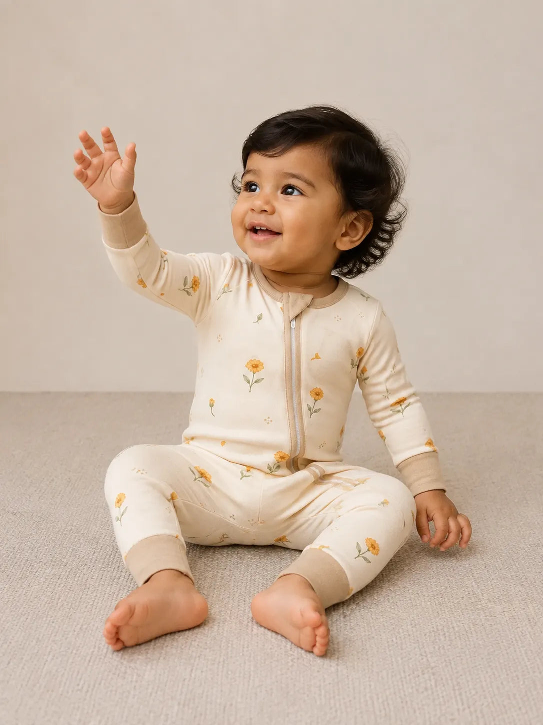 Baby wearing the Golden Bloom bamboo zipper romper