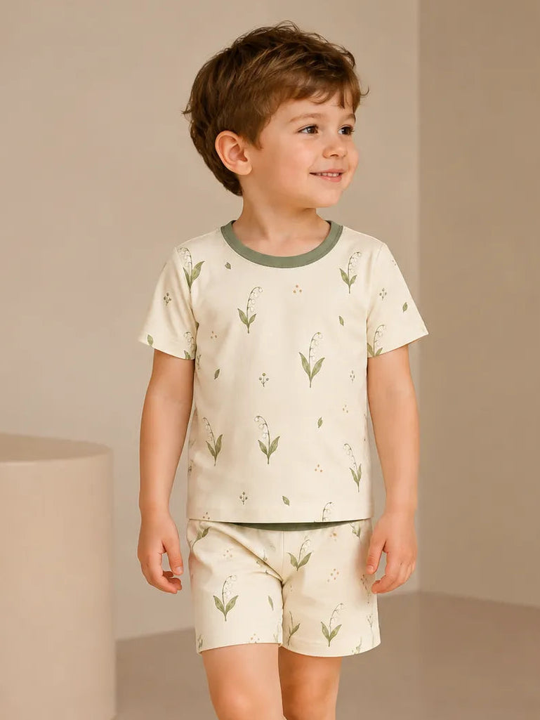 Child wearing the Little Botanicals short sleeve pajama set