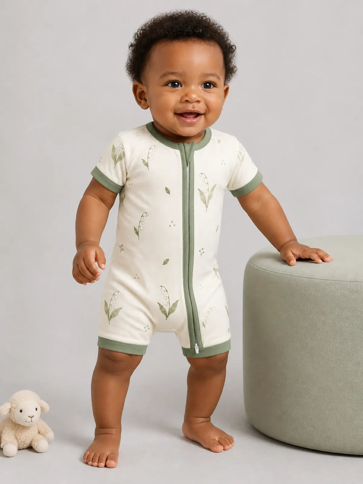 Baby wearing the Little Botanicals bamboo shorty romper