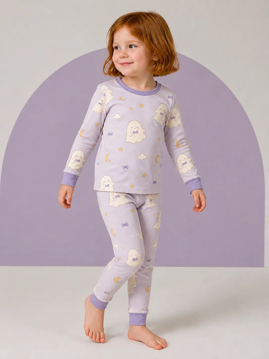 Child wearing the Boo & Moon long sleeve pajama set