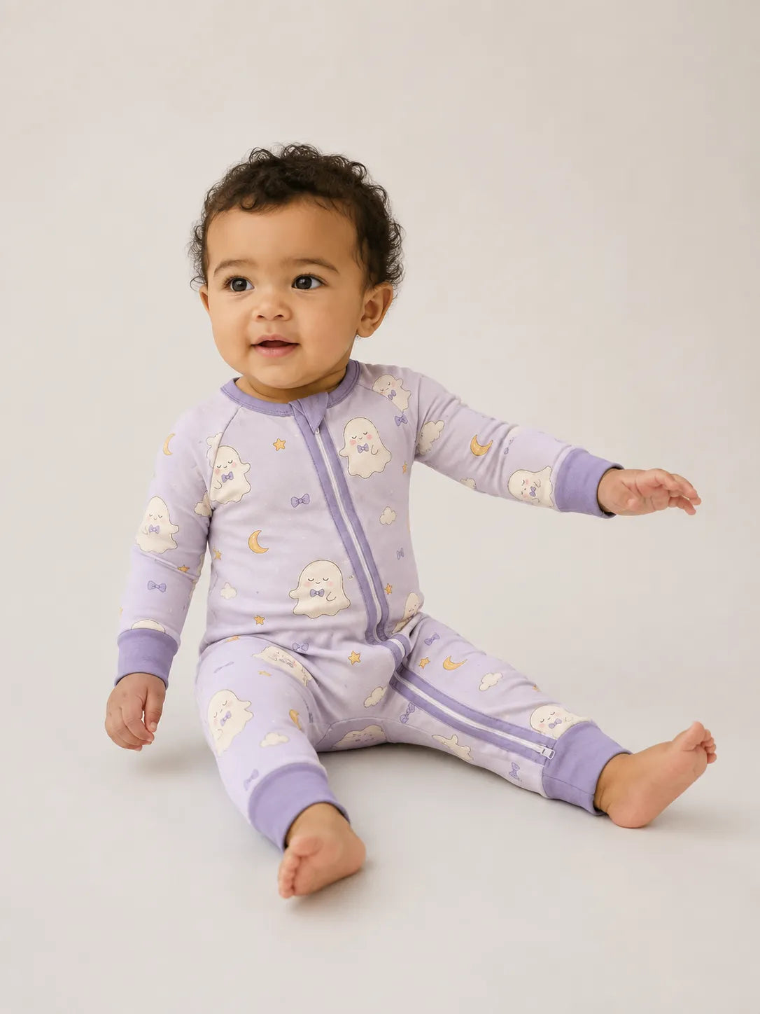 Baby wearing the Boo & Moon bamboo zipper romper