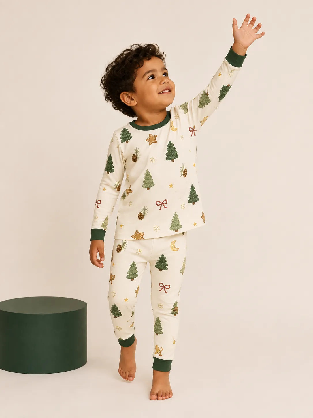 Child wearing the Christmas Forest long sleeve pajama set