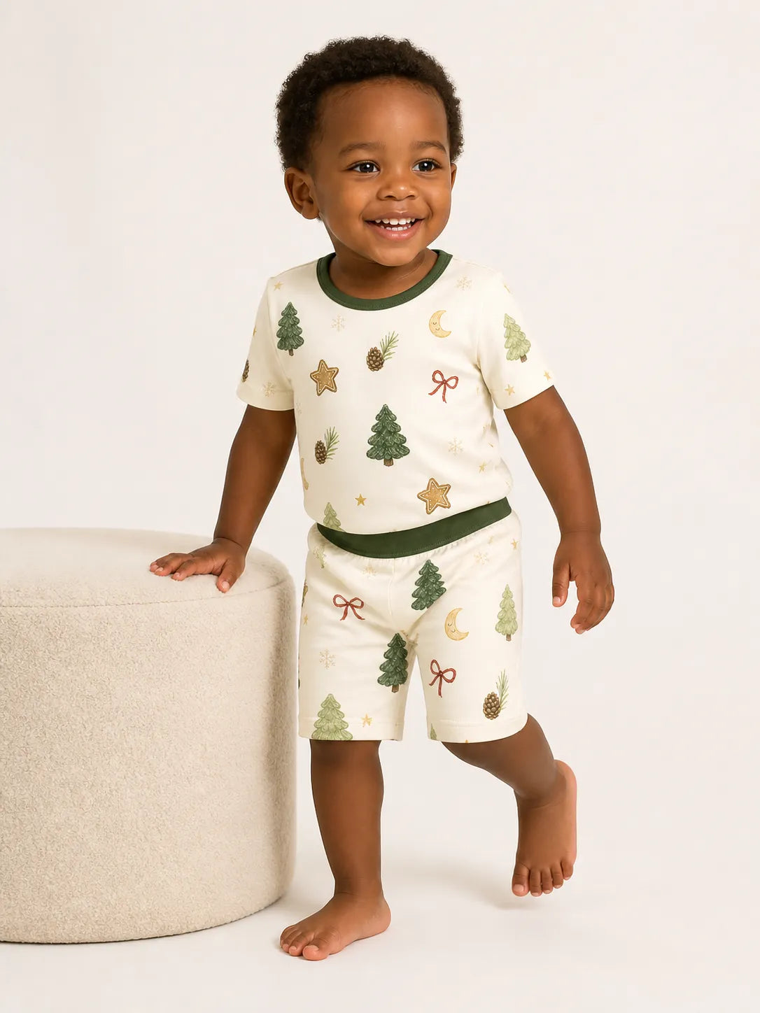 Child wearing the Christmas Forest short sleeve pajama set