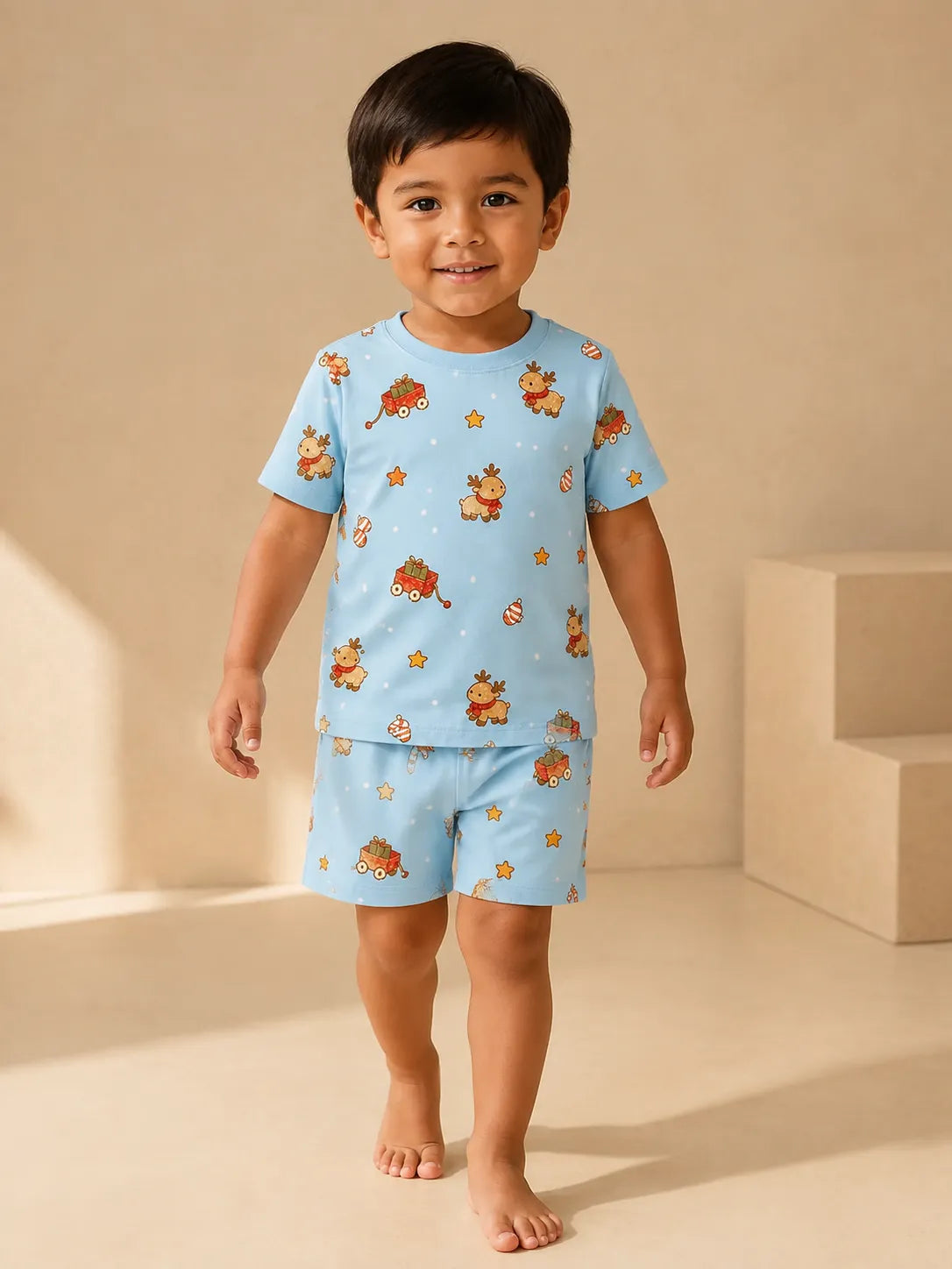 Child wearing the Reindeer Ride short sleeve pajama set