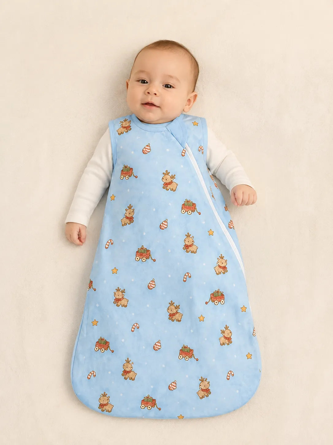 Baby wearing the Reindeer Ride bamboo sleep bag