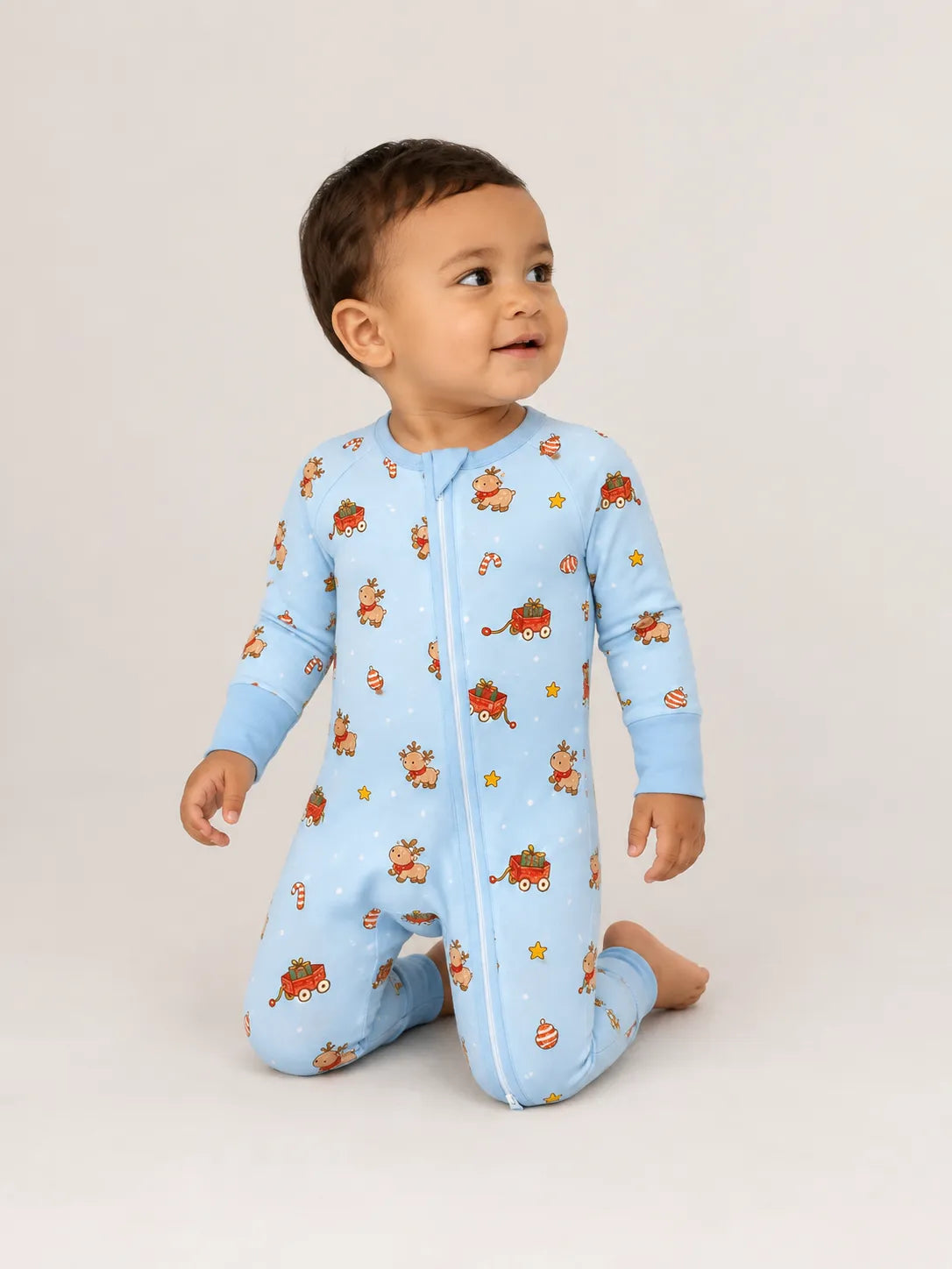 Baby wearing the Reindeer Ride bamboo zipper romper