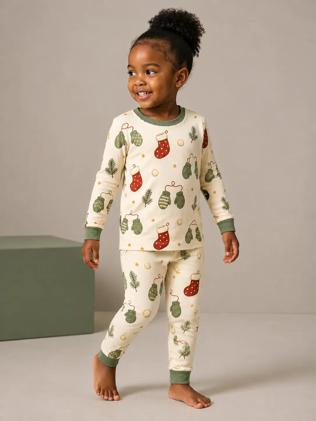 Child wearing the Christmas Stockings long sleeve pajama set