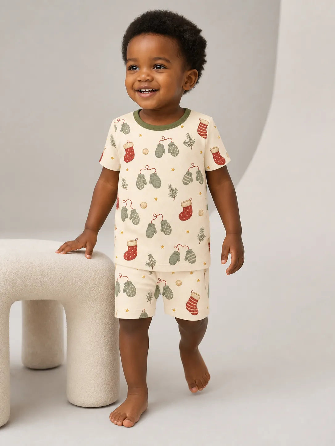 Child wearing the Christmas Stockings short sleeve pajama set