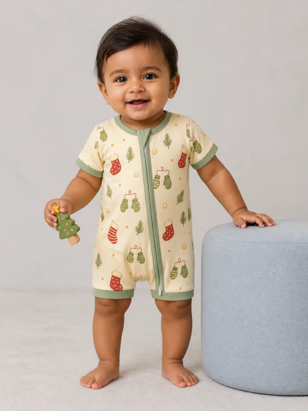 Baby wearing the Christmas Stockings bamboo shorty romper