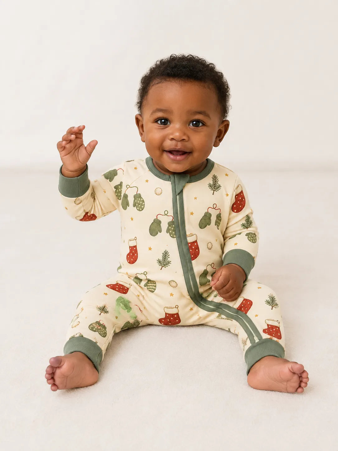 Baby wearing the Christmas Stockings bamboo zipper romper