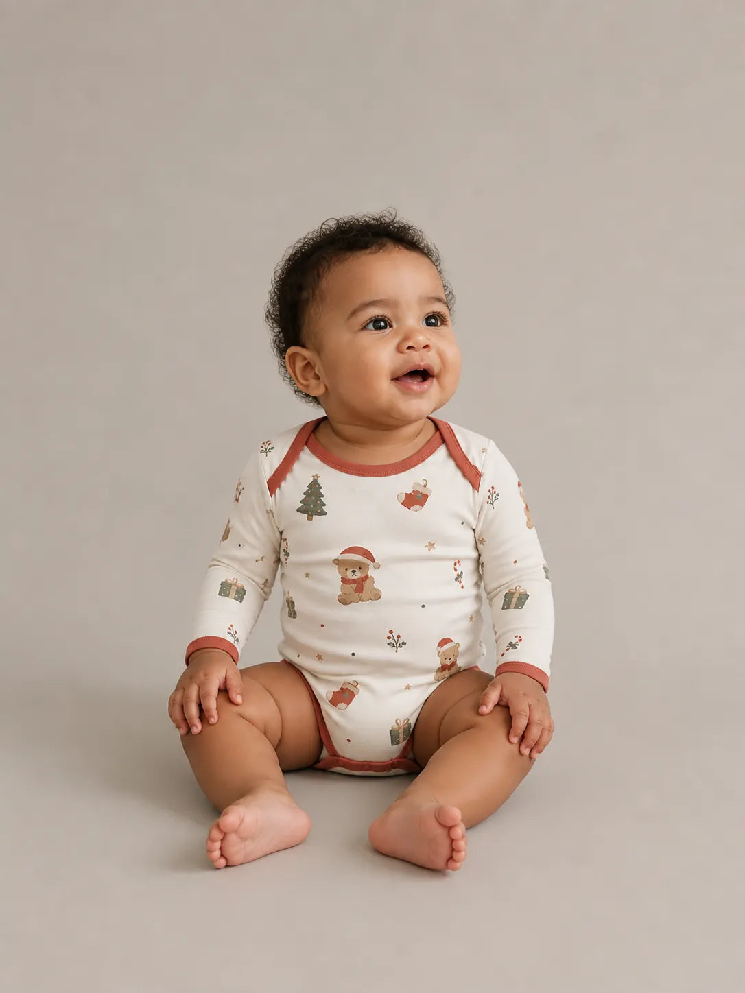 Baby wearing the Christmas Teddy long sleeve bodysuit