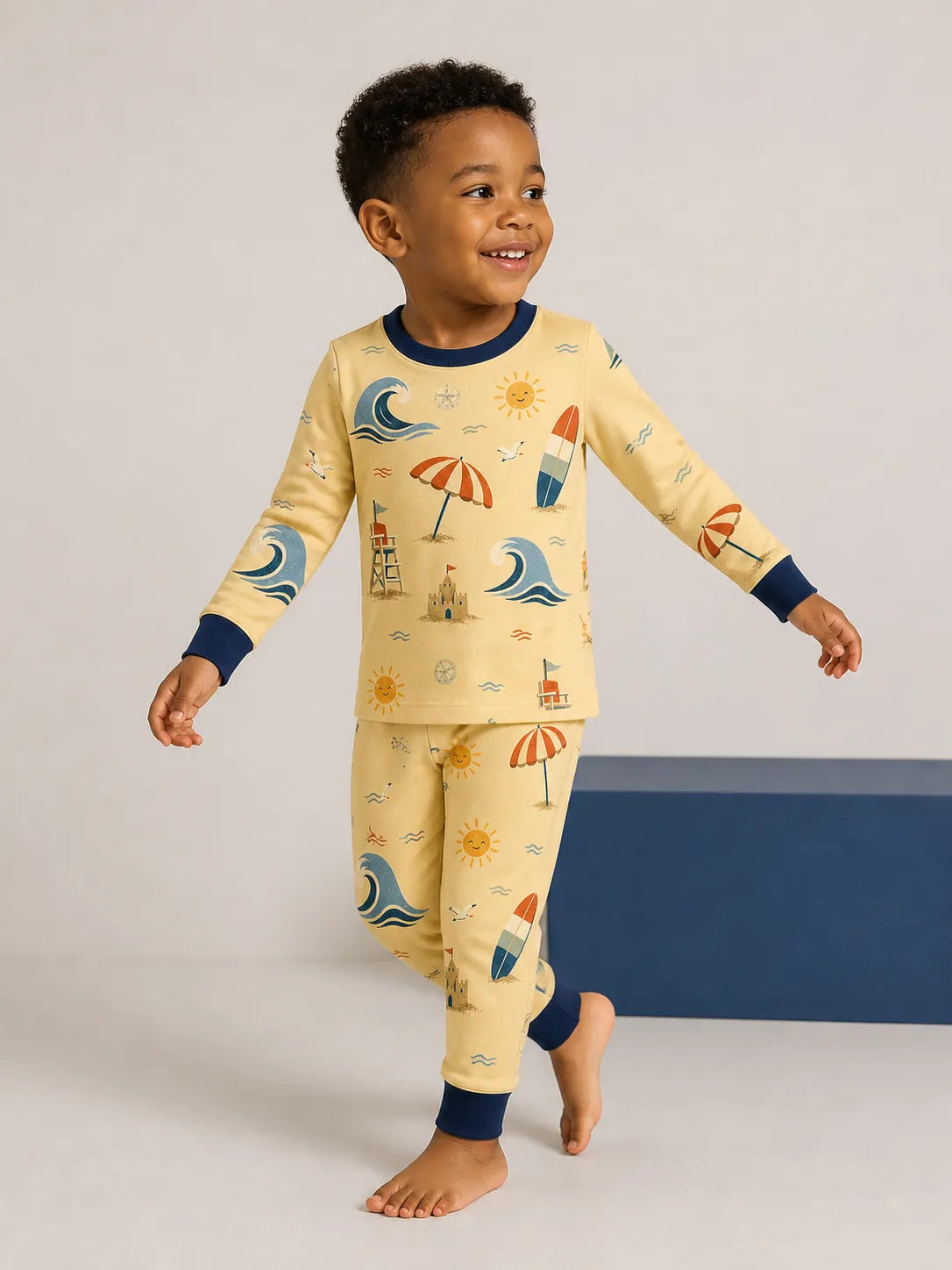 Child wearing the Beach Day long sleeve pajama set