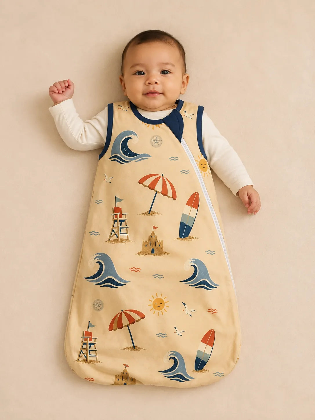 Baby wearing the Beach Day bamboo sleep bag