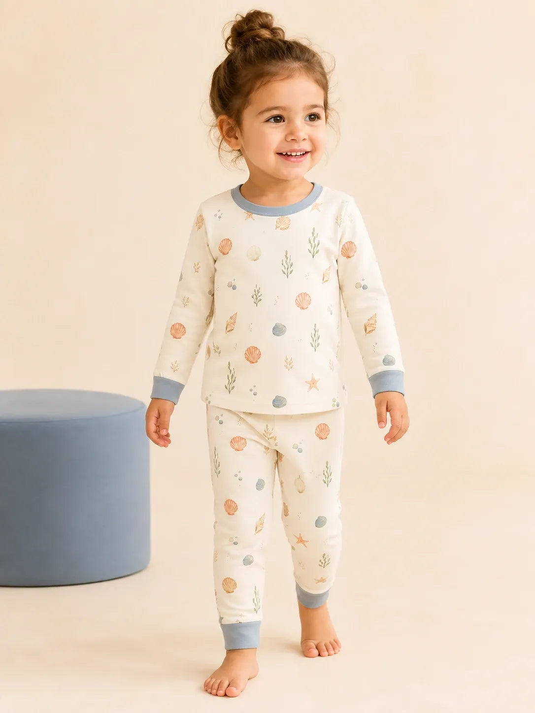 Child wearing the Seaside Treasures long sleeve pajama set