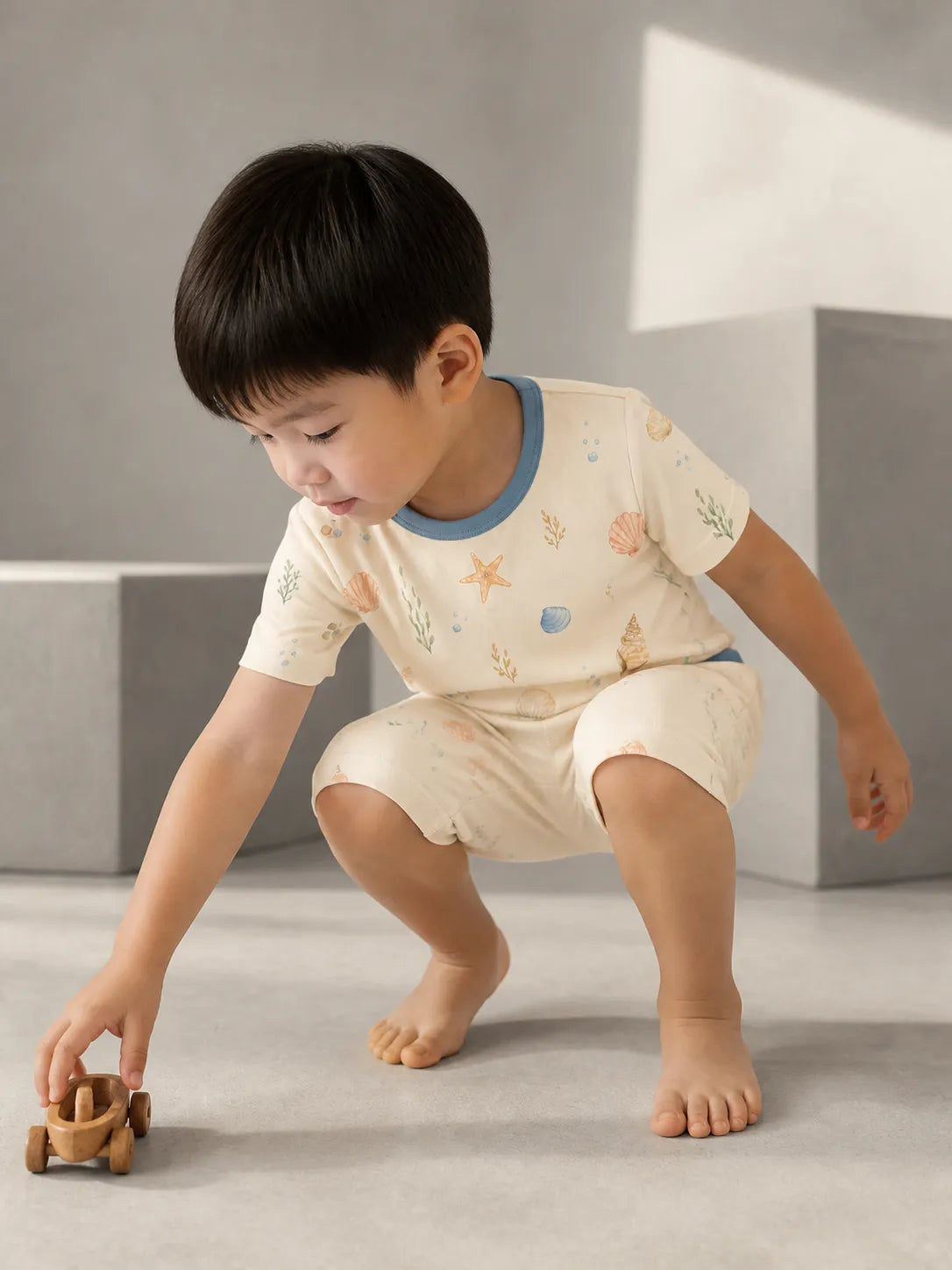 Child playing at home in Seaside Treasures bamboo pajamas