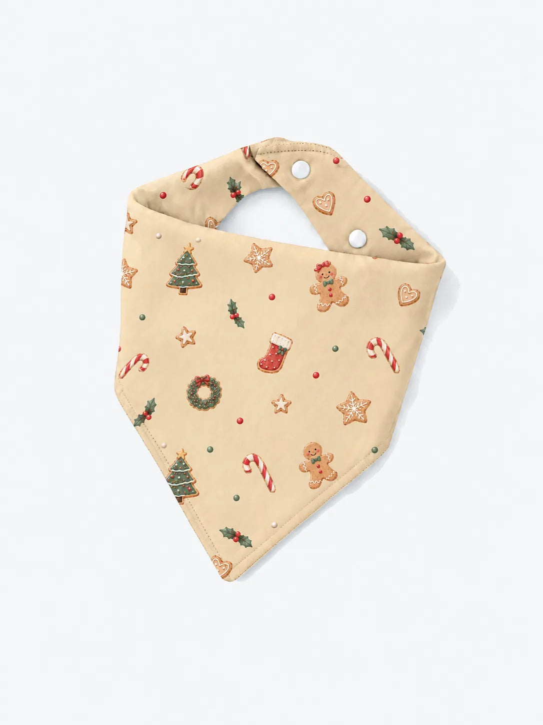 MossiBaby Christmas Joy baby bandana bib with gingerbread print, a triangular shape, stitched edge and back snaps.