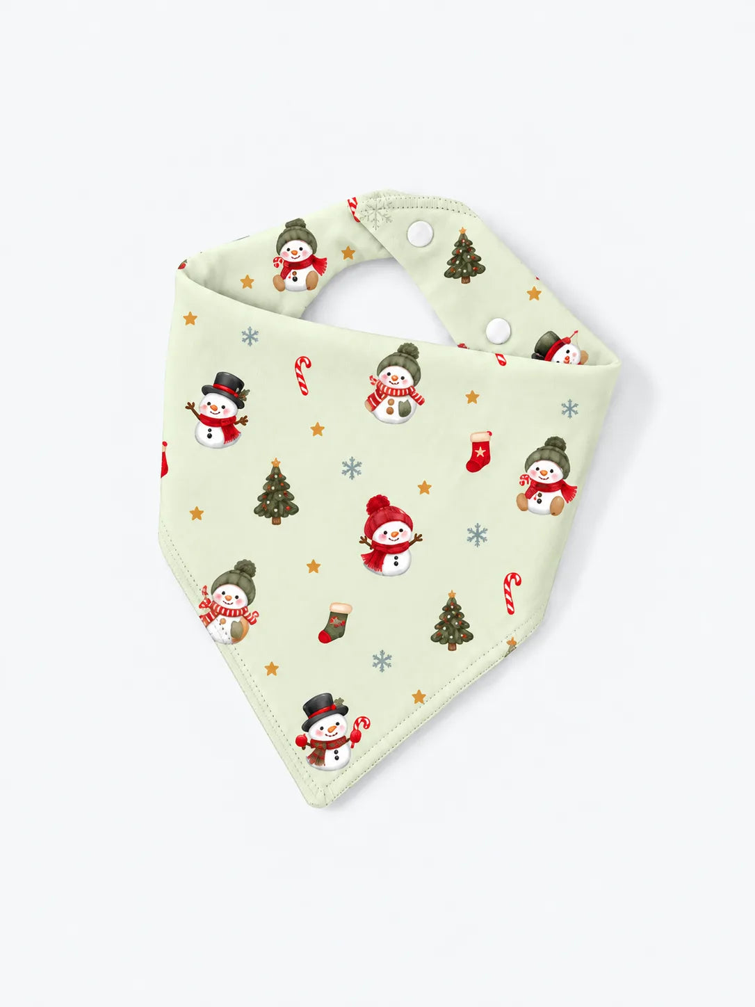 Baby sitting in a studio wearing Mossibaby Christmas Snowman pale green bamboo bandana bib