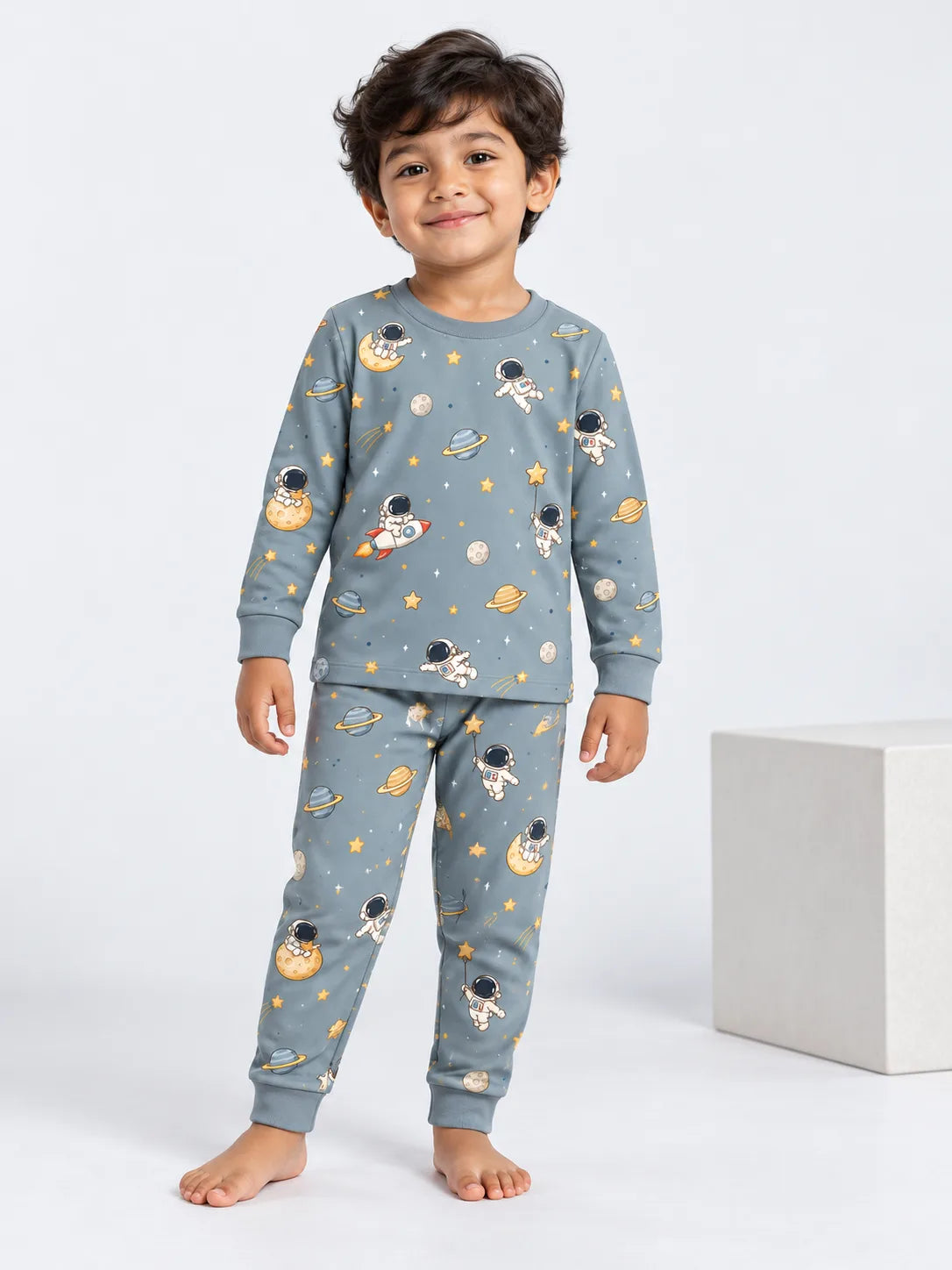 Toddler modeling Mossibaby Space Adventures bamboo long sleeve pajamas